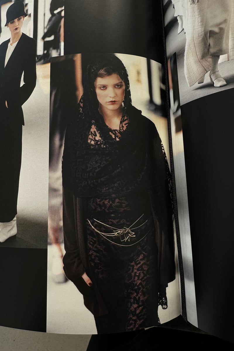 Fall 1998 Chanel by Karl Lagerfeld "Coco's Deauville" Runway Black Knit Chanel Logo Dress