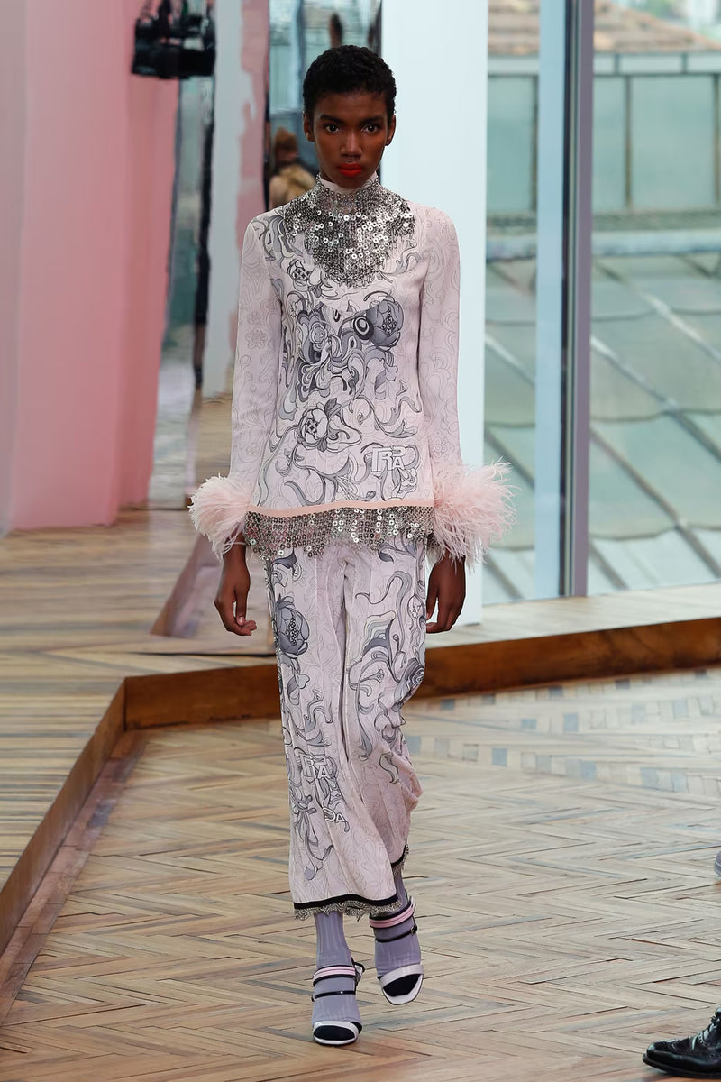 Resort 2018 Prada by Miuccia Runway Look 23 Printed Pale Pink Mini Dress w Feather Cuffs