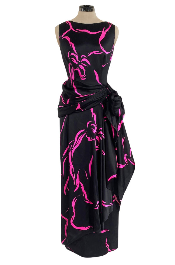 Fall 1985 Unlabeled Ady Couture for YSL Black Silk Hip Swag Dress w Pink Bow Print